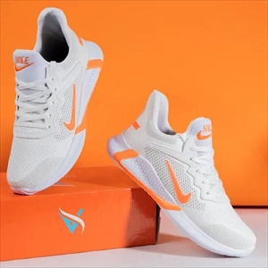 1000 کفش ورزشی نایک مردانه سفید نارنجی م (2024)