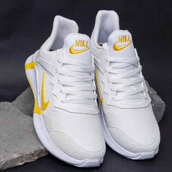 1000 کفش ورزشی نایک مردانه سفید زرد مدل  (2024)